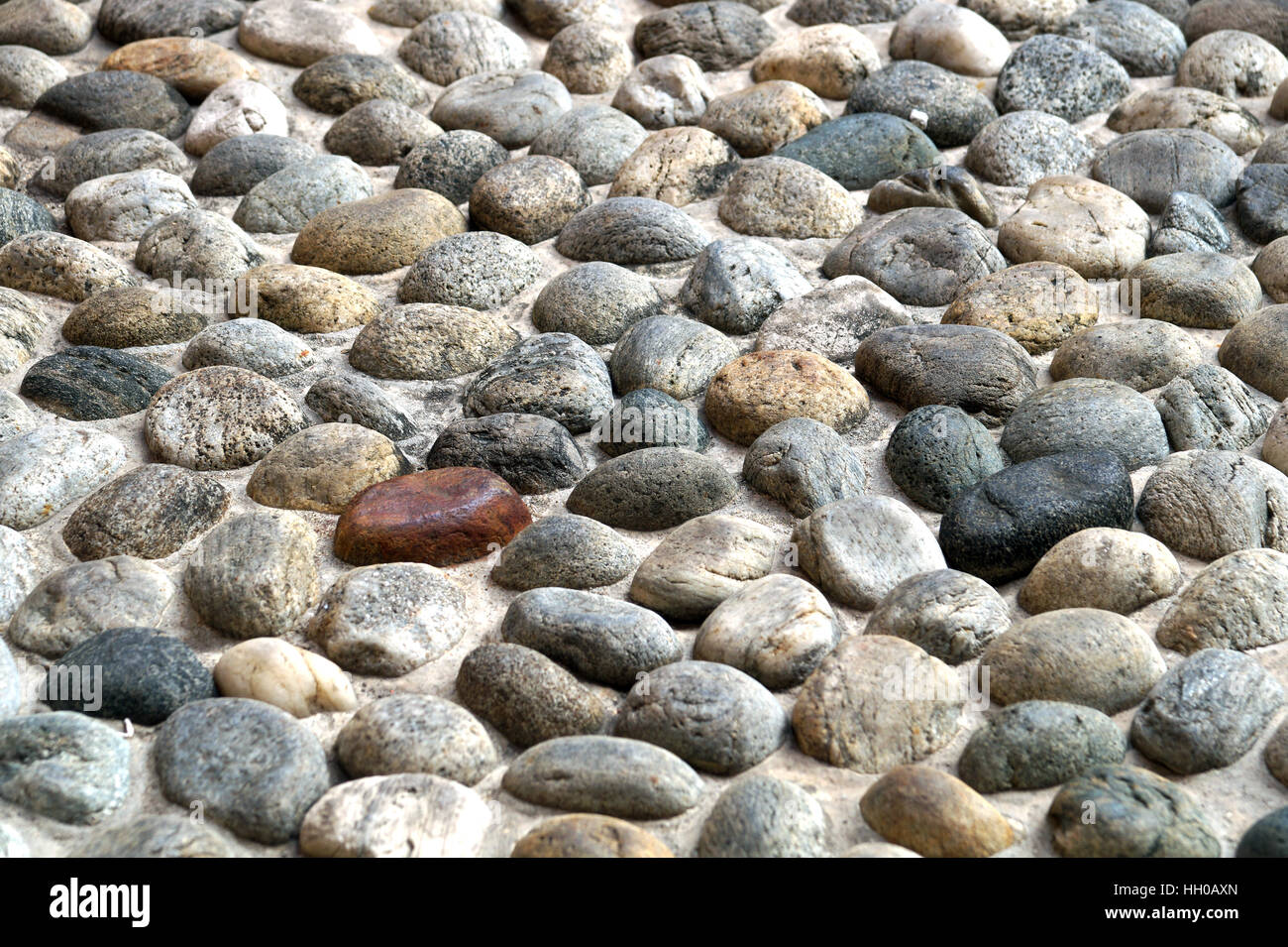 Pebble stone texture wall and seamless background Stock Photo
