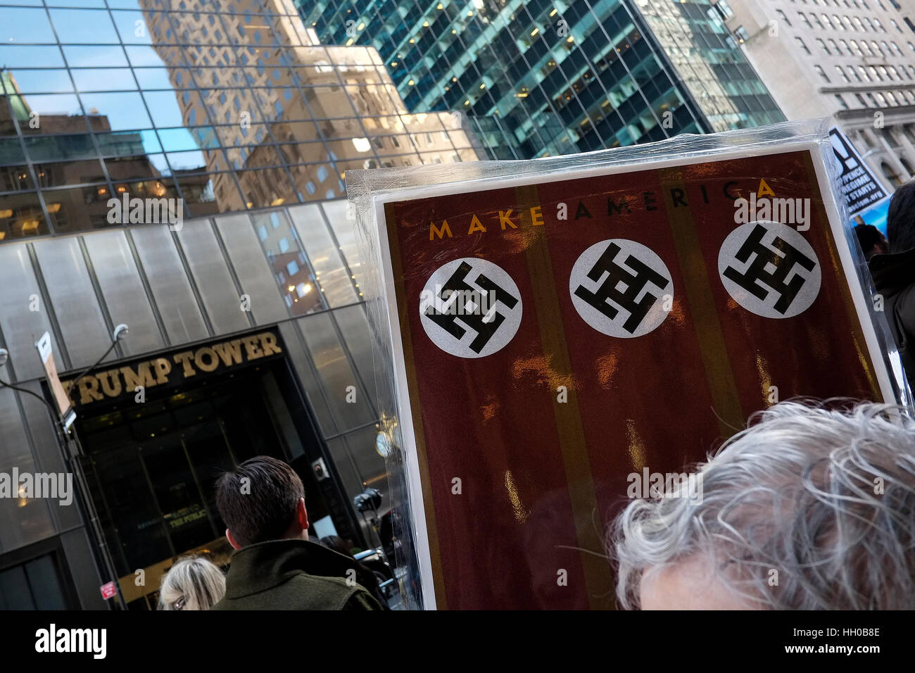 People protest outside Trump Tower in Manhattan as President Elect Donald Trump holds his first press conference of 2017. Stock Photo