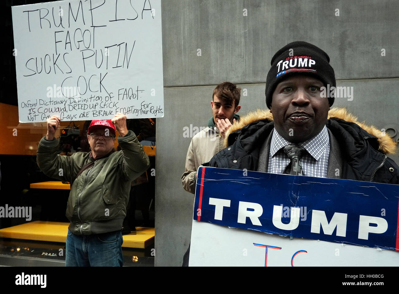 People protest outside Trump Tower in Manhattan as President Elect Donald Trump holds his first press conference of 2017. Stock Photo