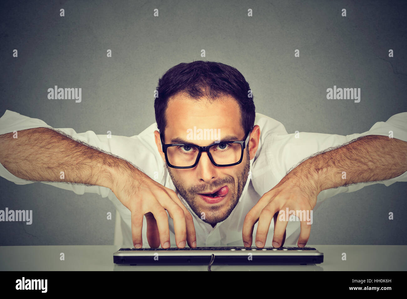Computer geek typing on keyboard hires stock photography and images Alamy