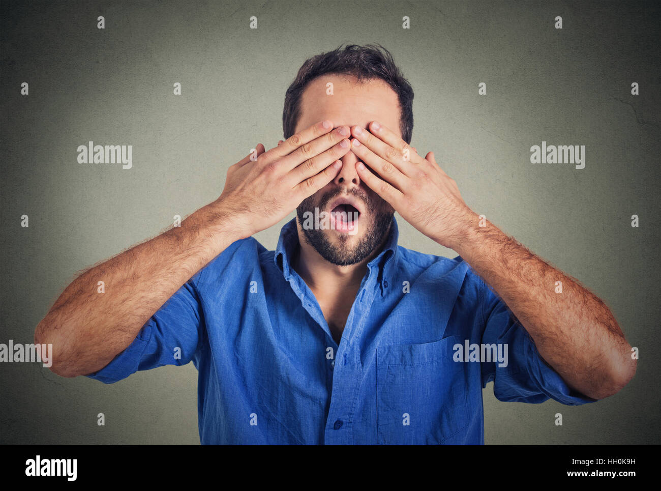 Man scared hands face hi-res stock photography and images - Alamy