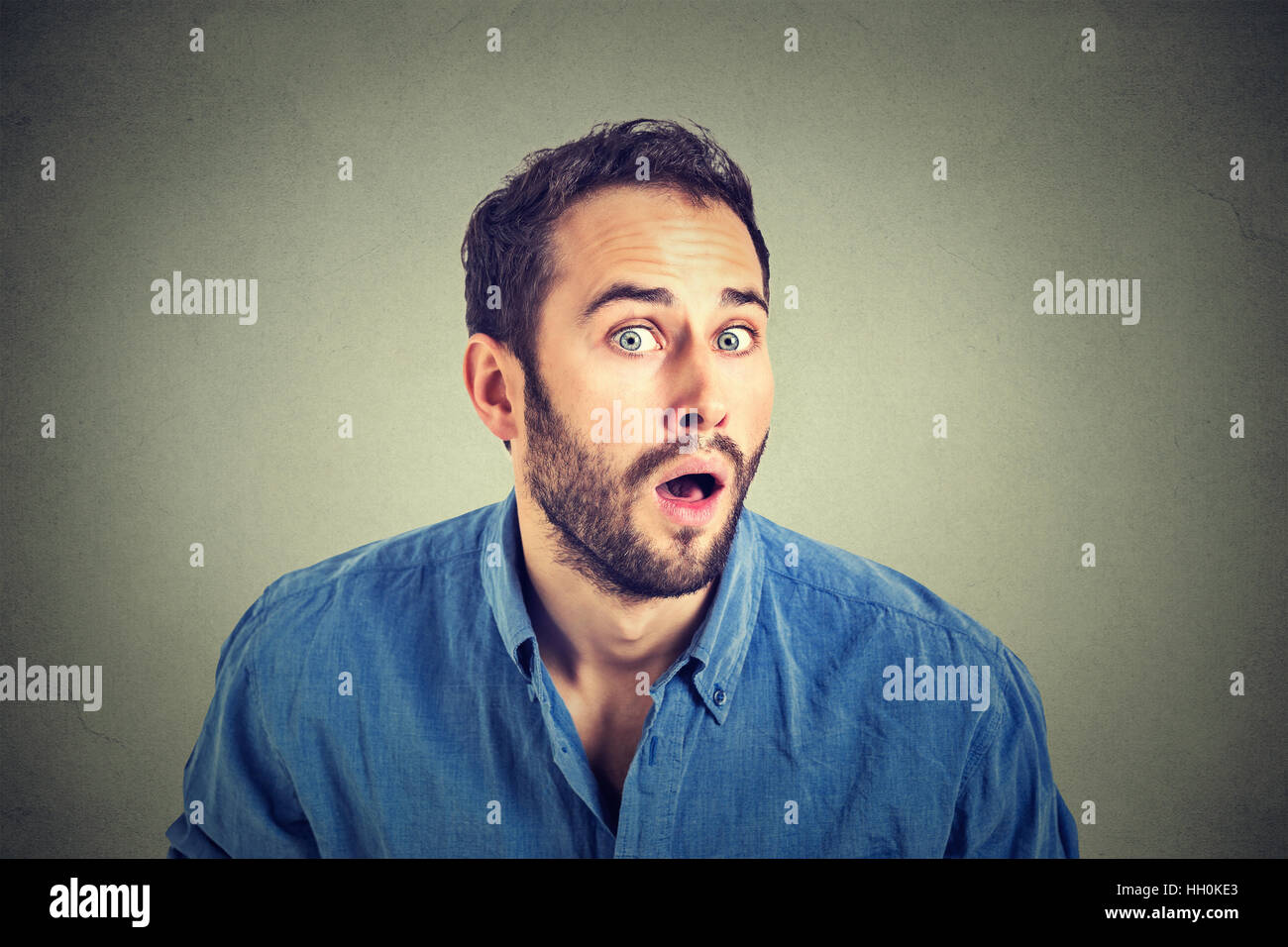Portrait of a shocked young man in full disbelief Stock Photo
