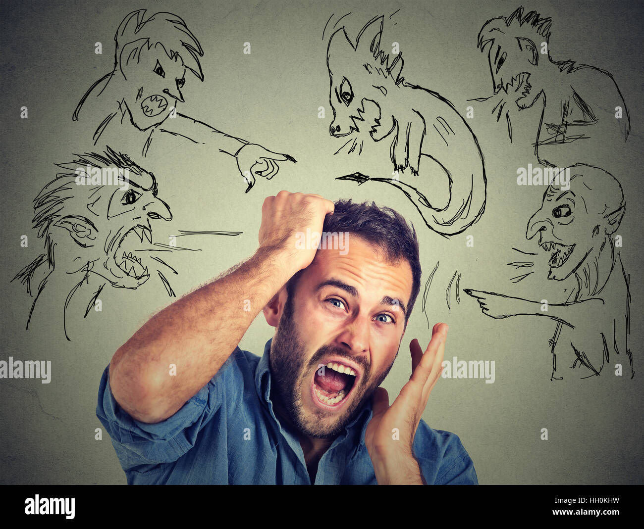 Evil men pointing at stressed anxious guy. Desperate businessman ...
