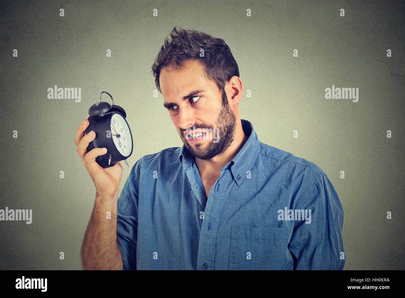 Man with clock hires stock photography and images Alamy