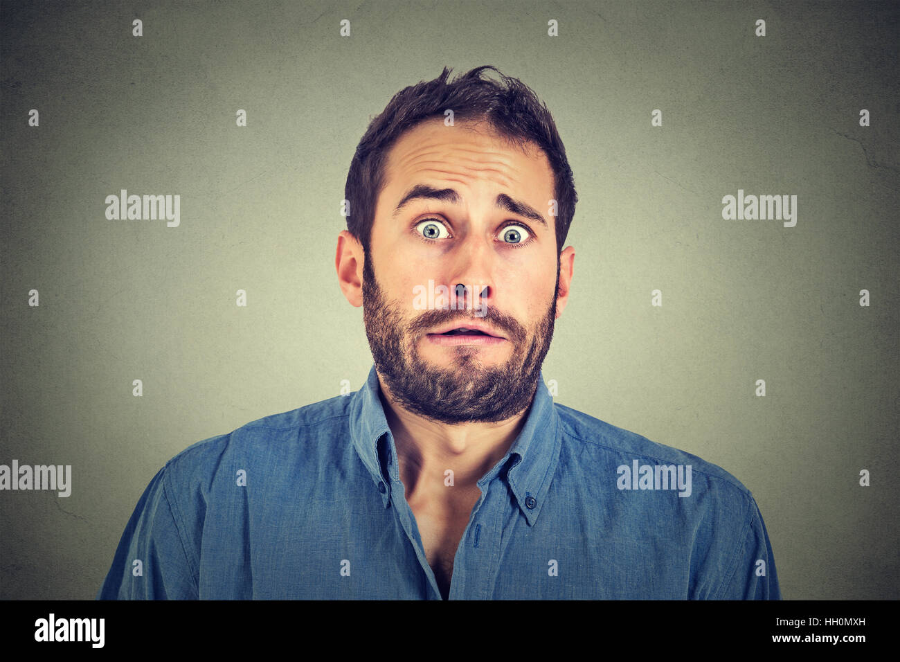 Concerned scared man Stock Photo - Alamy