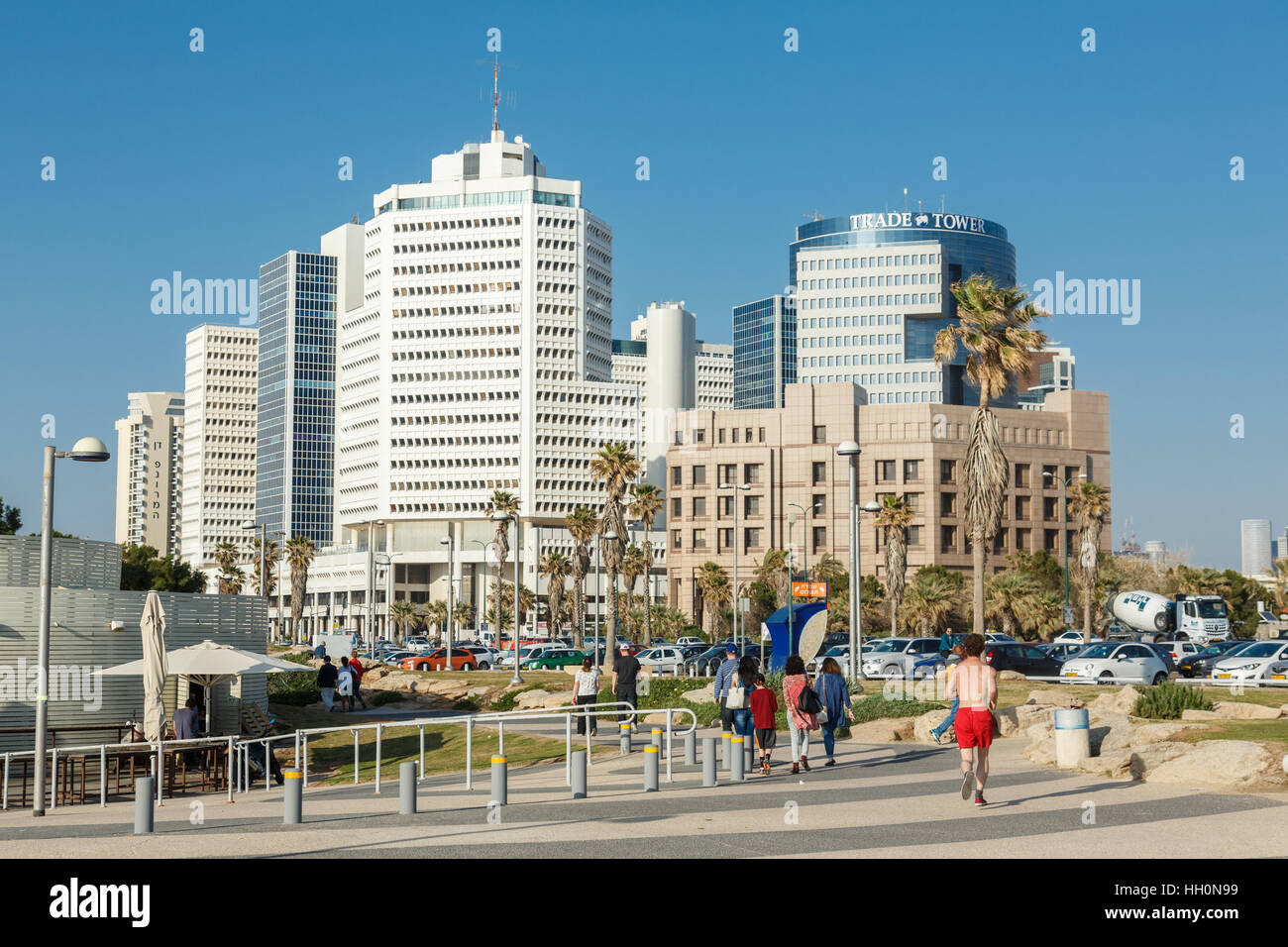 TEL AVIV,ISRAEL - April 4, 2016 : People walking and jogging  on a seaside promenade in TelAviv, Israel on on April 4, 2016 Stock Photo