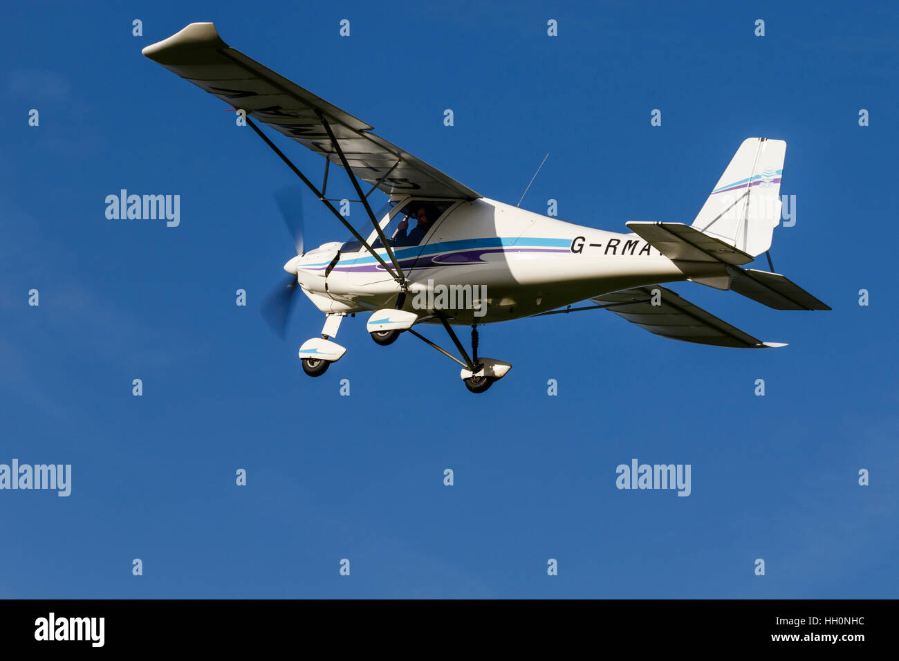 Ikarus C42 FB80 G-RMAV in flight after take-off from Breighton Airfield Stock Photo
