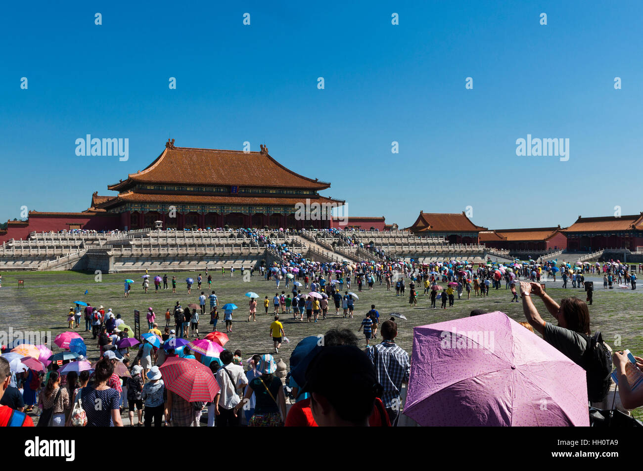 Beijing, China - July 29, 2012: Visitors entering in the Forbidden City in Beijing, China. Stock Photo