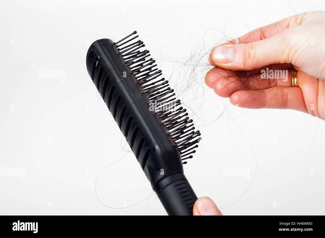Pulling hair out hi-res stock photography and images - Alamy