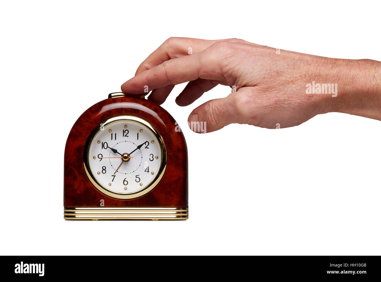 Hand on Special Jukebox Alarm clock isolated on white with clipping