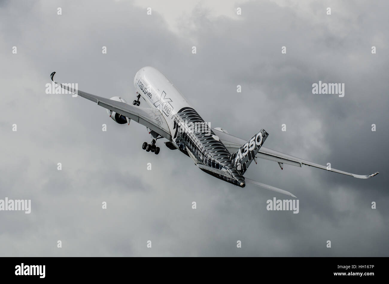 Airbus A350 XWB (extra wide body) climbing out to display at the 2016 Farnborough International Airshow Stock Photo