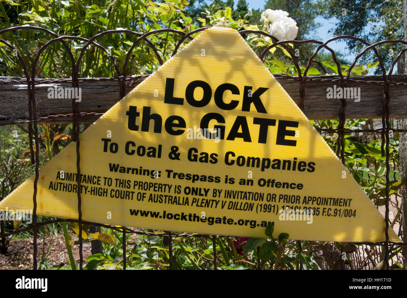 Farm gate sign protesting the intrusion of mining companies onto rural land across Australia. Stock Photo