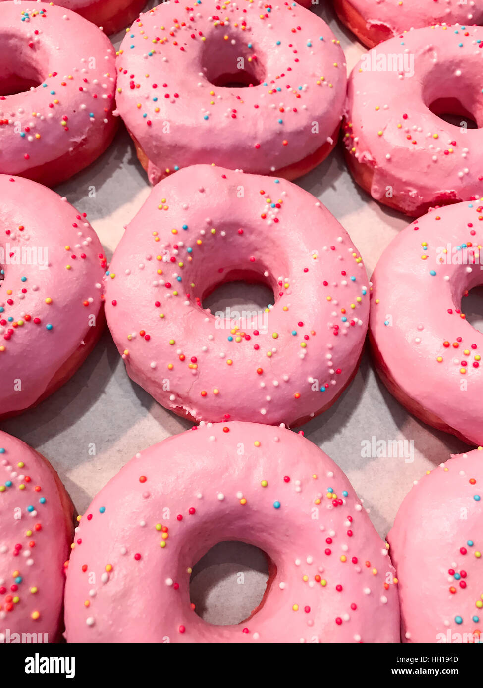 Donuts with sprinkles in the food market Stock Photo