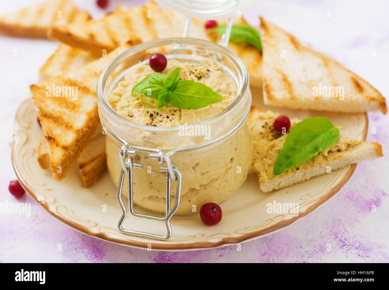 Pate Chicken rillette, toast and herbs on a plate Stock Photo Alamy