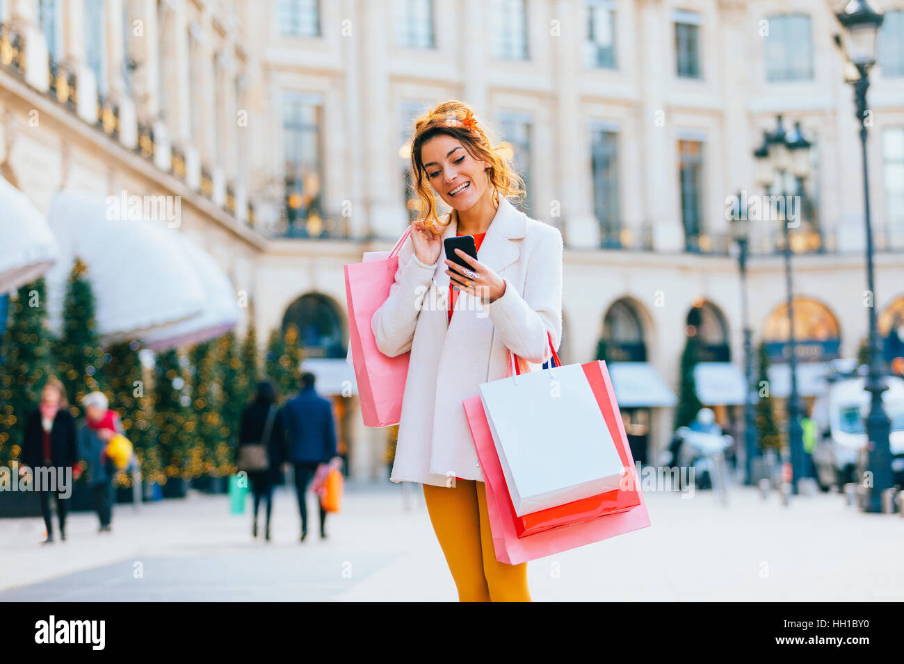Woman doing shopping in Paris, Place Vendome Stock Photo
