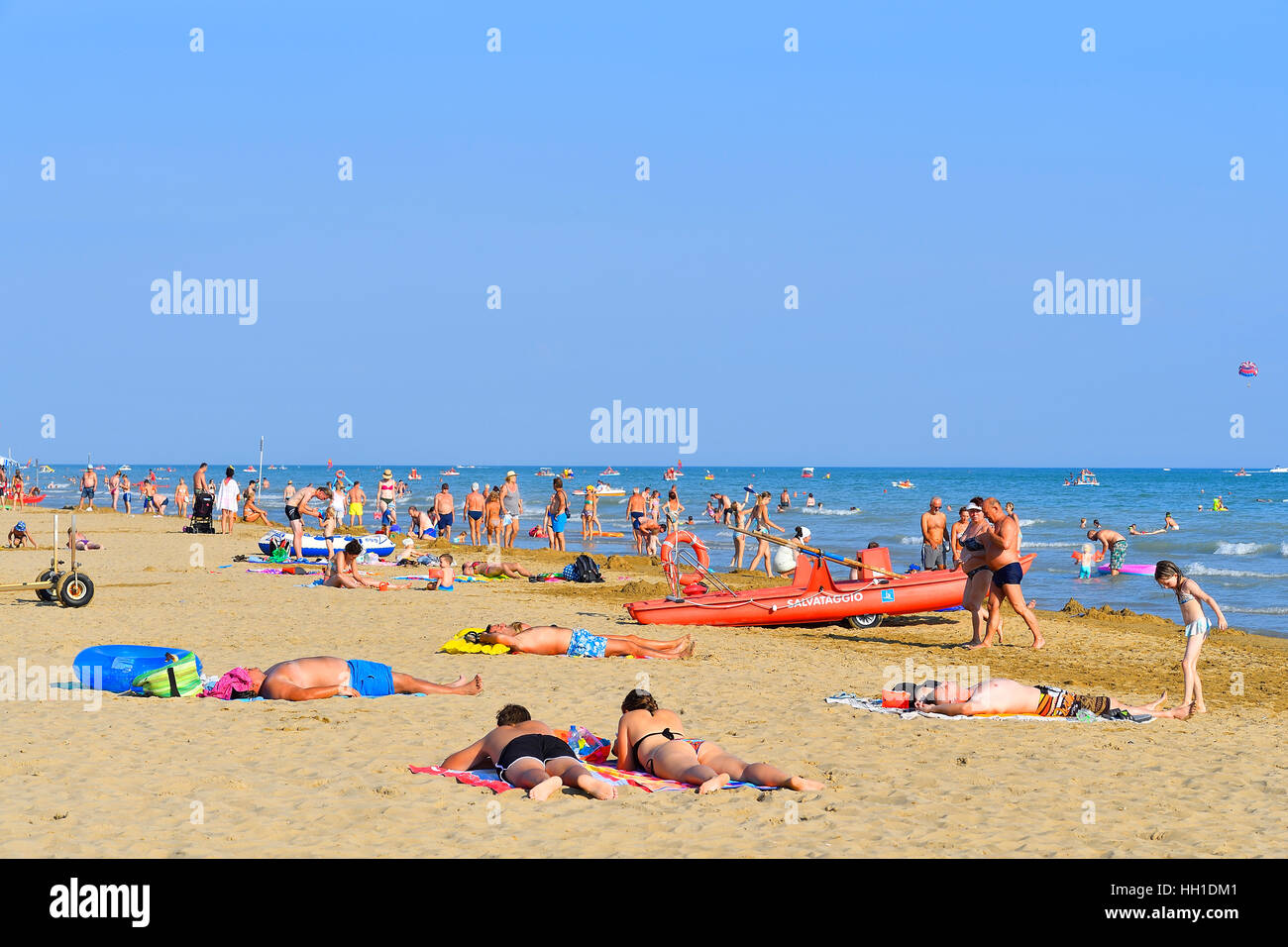 Bathers on a sandy beach, Bibione, Adriatic Sea, Veneto, Italy Stock Photo