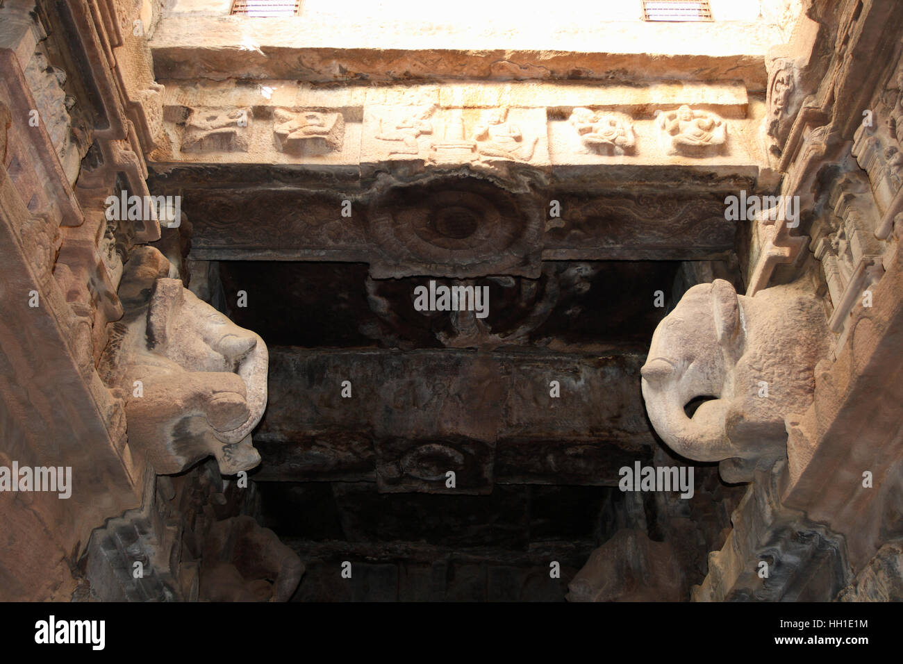 Decorations at the pillars and ceiling of a hindu temple dedicated to ...