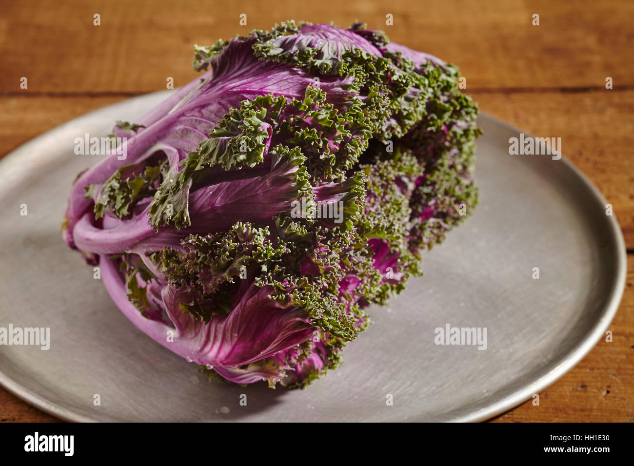 raw, fresh purple kale, a seasonal winter vegetable Stock Photo