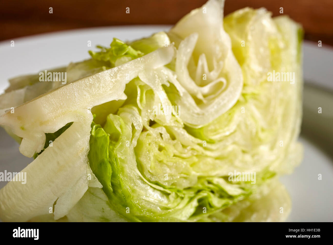 a wedge of iceberg lettuce Stock Photo Alamy