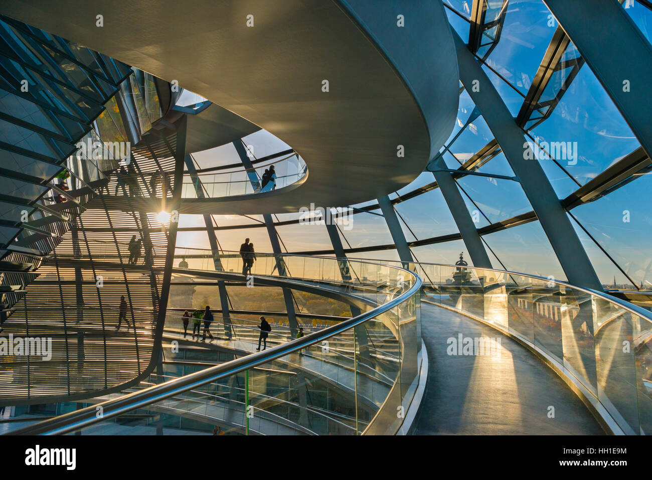 Interior of Reichstag dome with visitors in evening light, Reichstag, Bundestag, Berlin, Germany Stock Photo