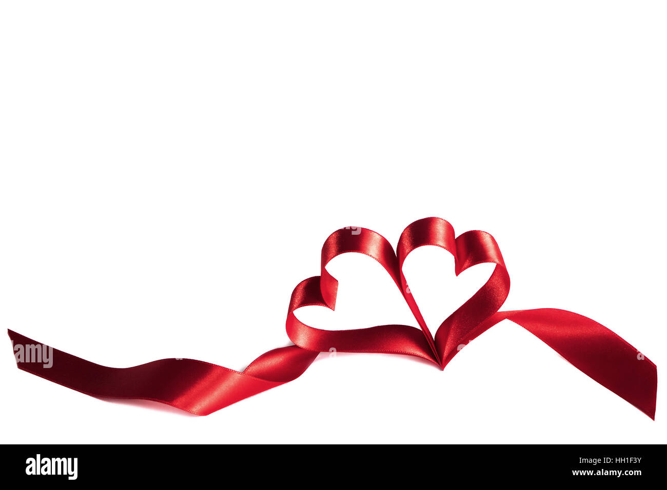 Two ribbon hearts isolated on white background Stock Photo - Alamy