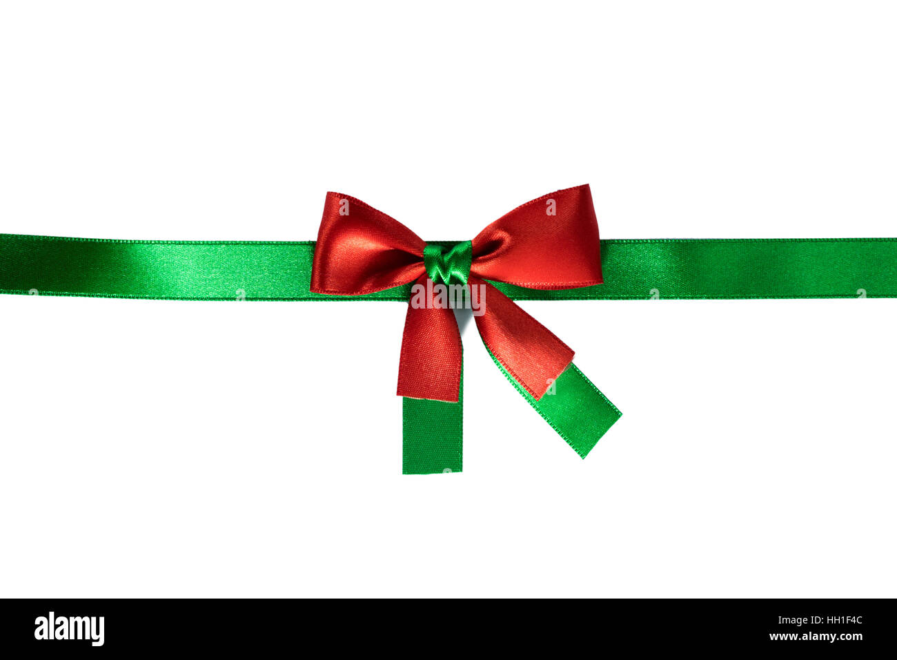 Red and green christmas ribbon bow isolated on white background Stock