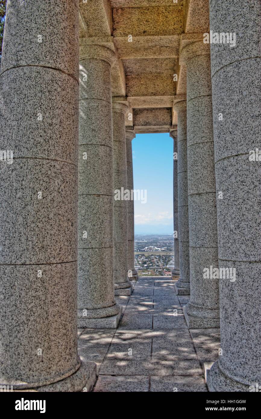 The view through the Doric pillars at Rhodes Memorial, on the slopes of Devil's Peak, Cape Town, South Africa Stock Photo
