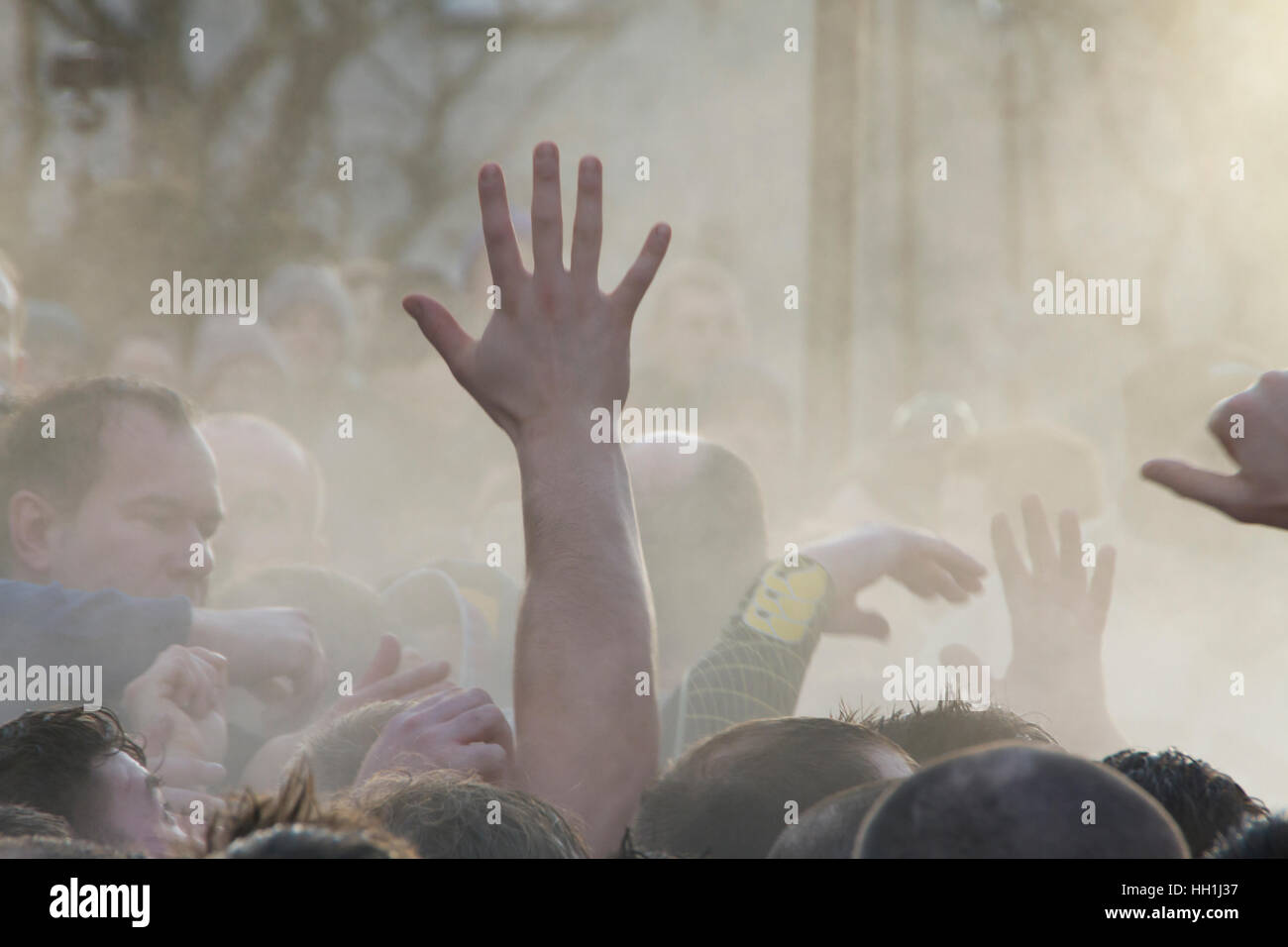 Hands above the Ba scrum, Kirkwall New Year Ba game Stock Photo