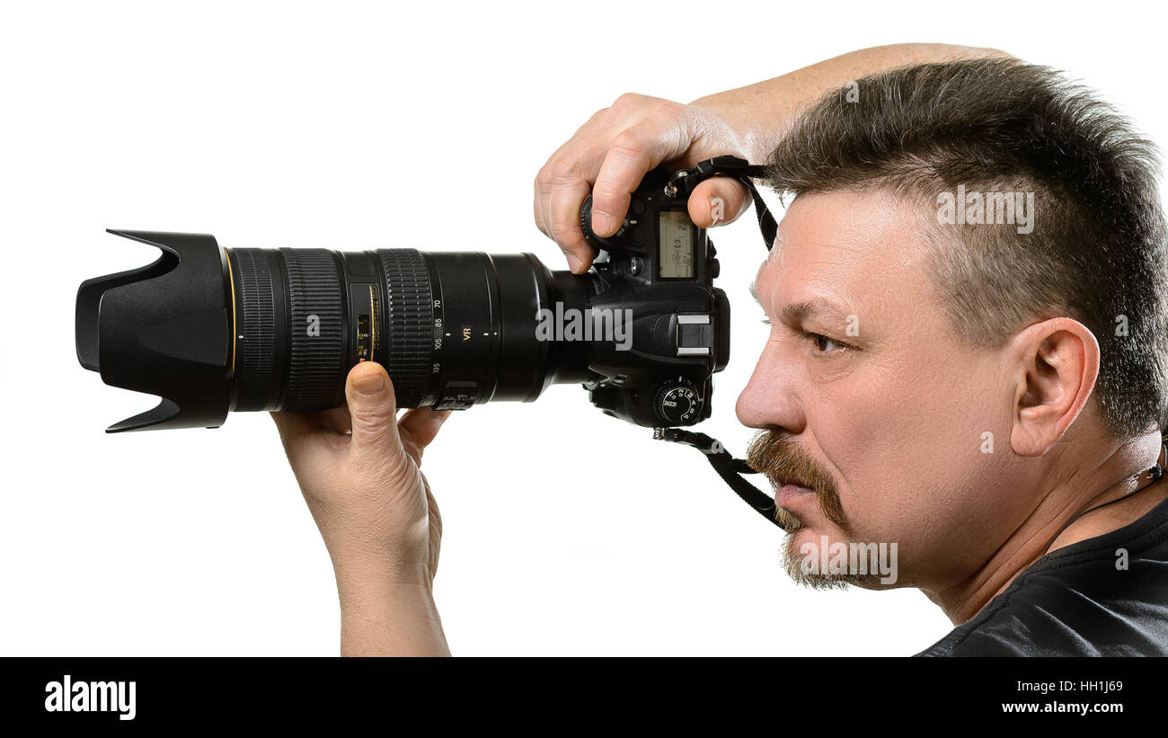 portrait photographer with a camera on an isolated background Stock ...