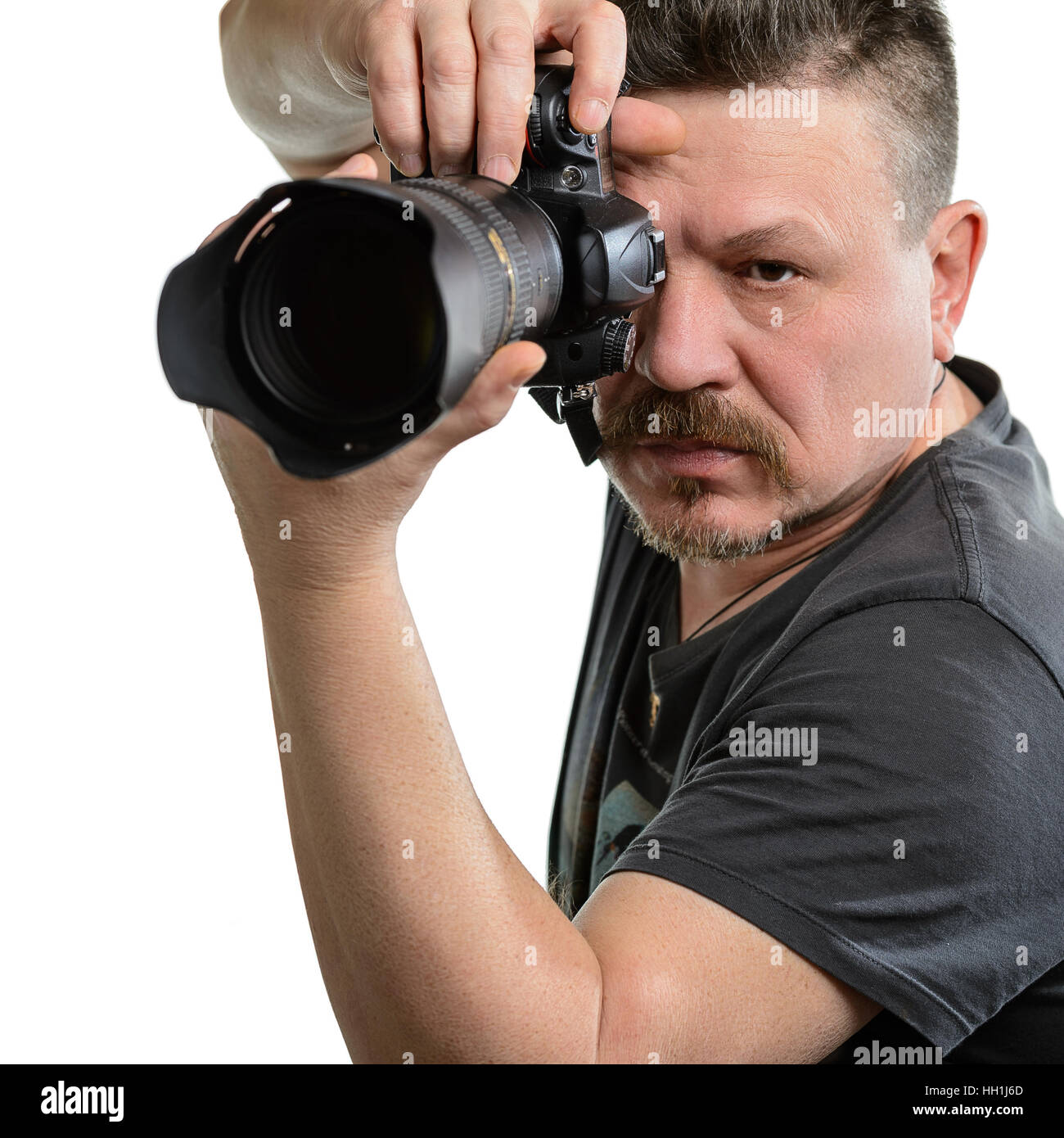 portrait photographer with a camera on an isolated background Stock ...