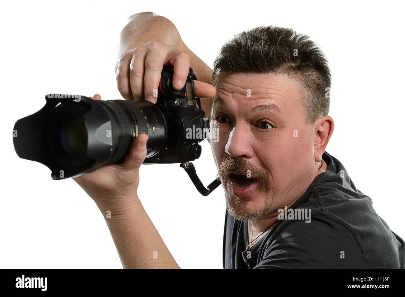 portrait photographer with a camera on an isolated background Stock ...