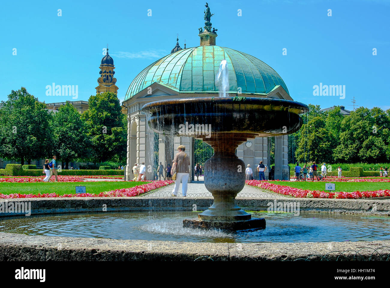 people-walk-in-the-garden-of-the-residenz-palace-in-munich-germany-on