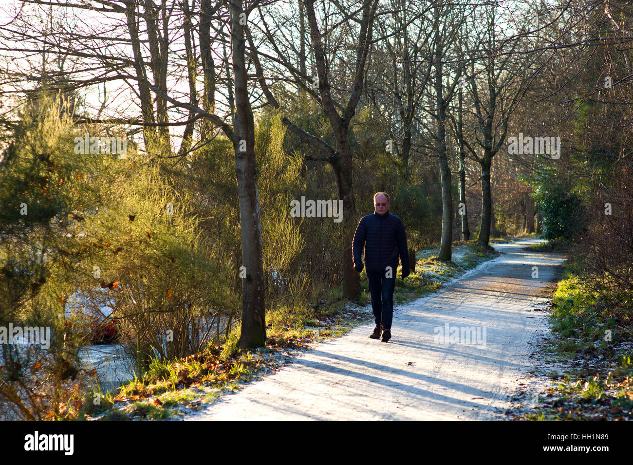 Walker on the Deeside way at Cults, Aberdeen. Former Royal Deeside
