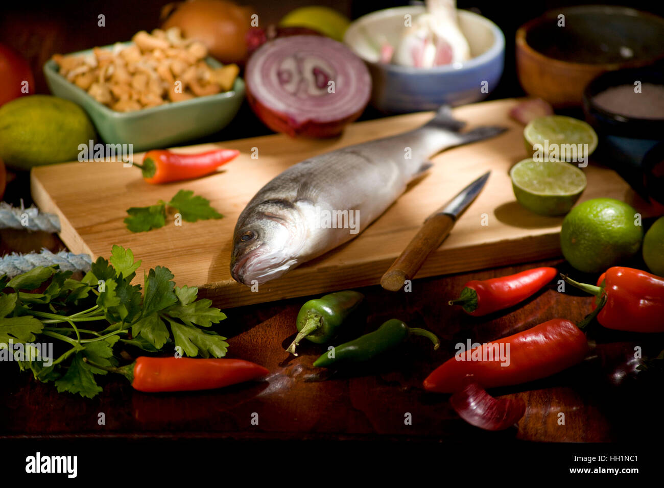 Whole Sea Bass with ingredients Stock Photo Alamy