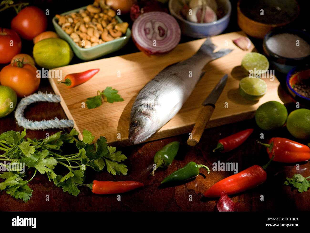 Whole Sea Bass with ingredients Stock Photo Alamy