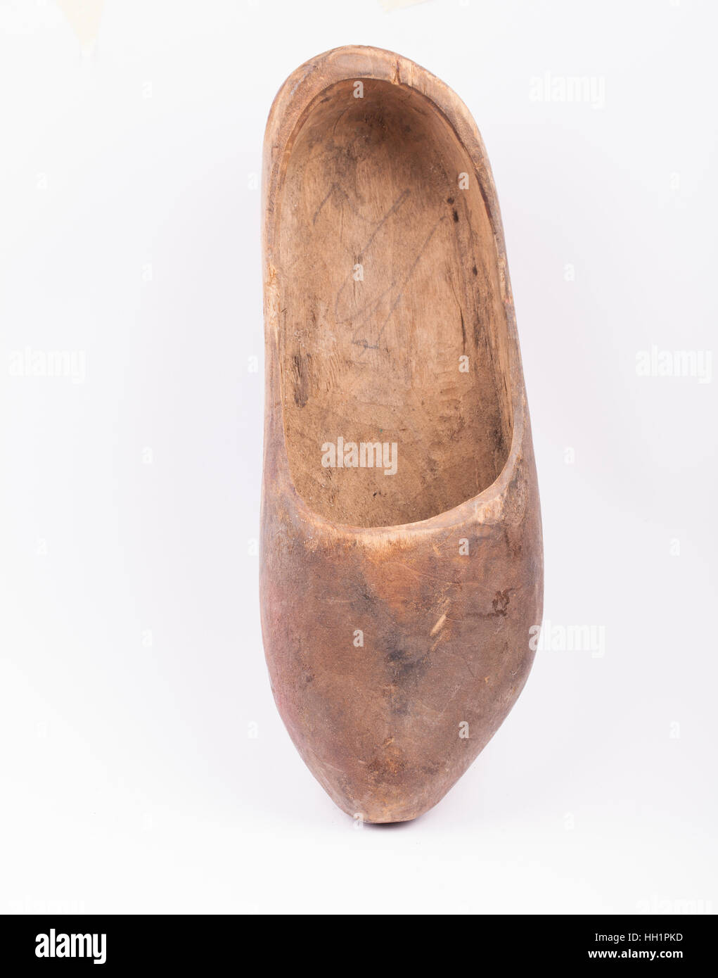 Old antique wood dutch boot isolated on white Stock Photo