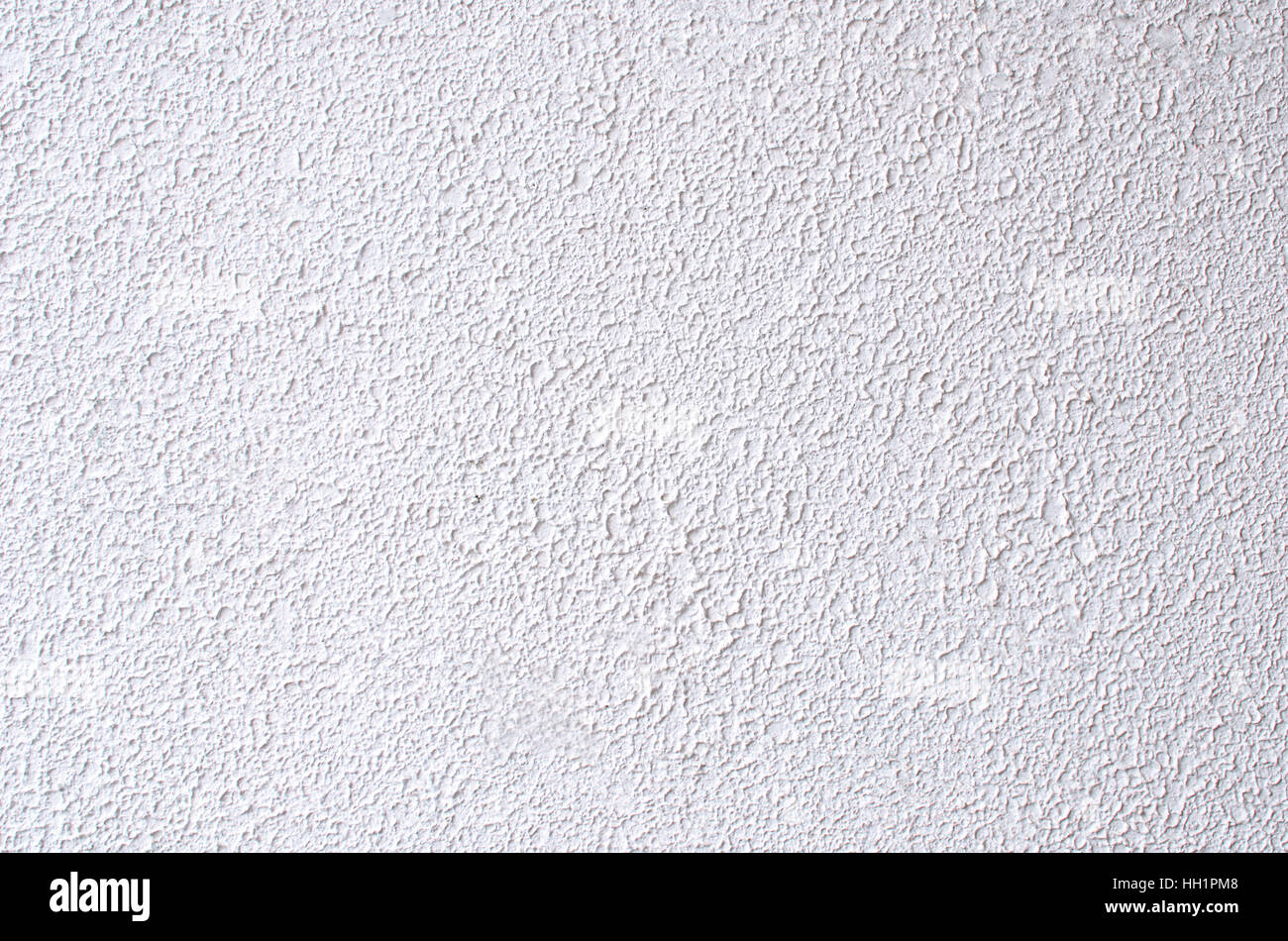 White rugged painted outside wall Stock Photo Alamy