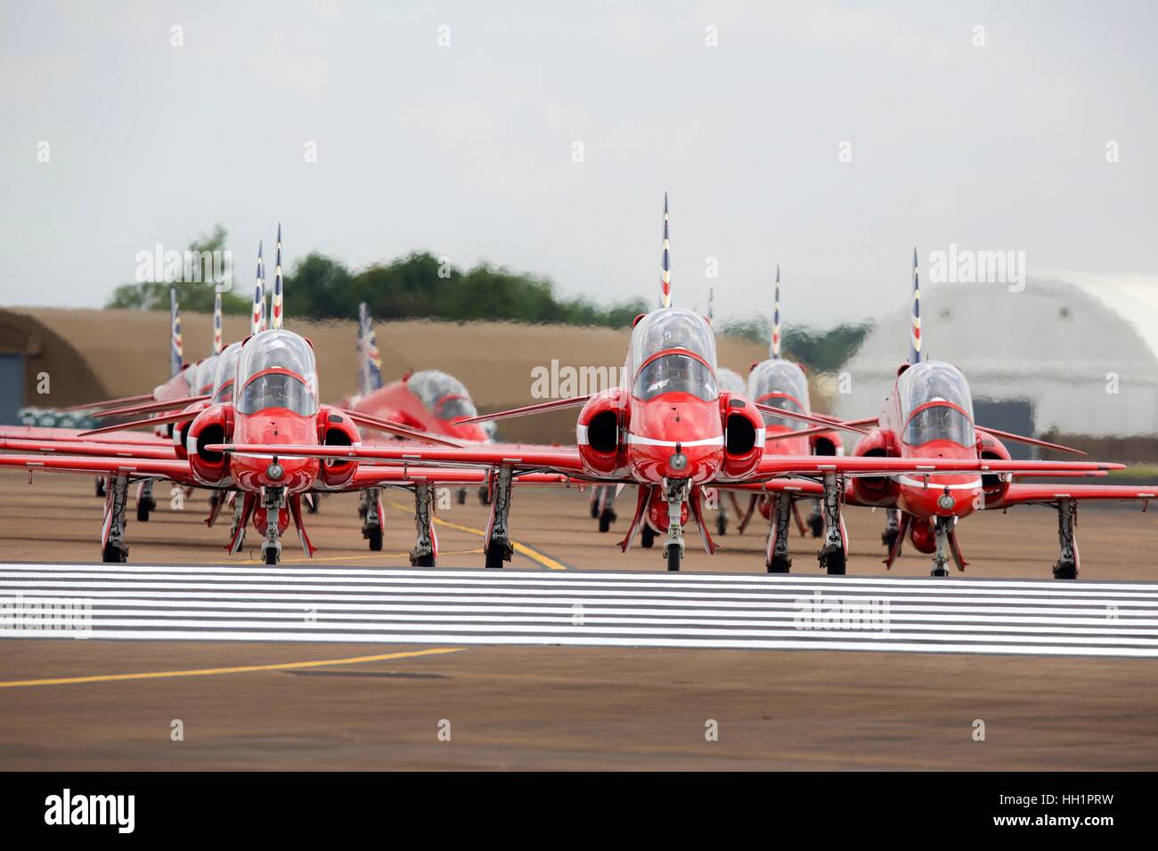 The Royal Air Force Red Arrows aerobatic team taxiing on the runway at RAF Fairford Stock Photo