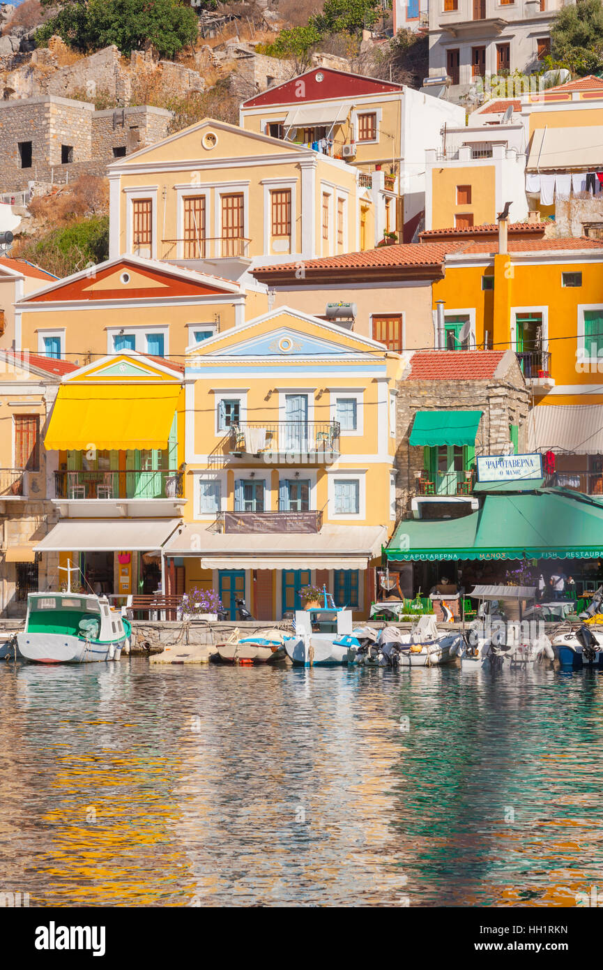 The buildings alongside the harbour on Symi Greece Stock Photo Alamy