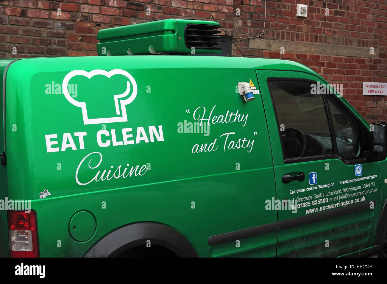 Eat Clean Craze Cafe,Warrington,Cheshire,England,UK - Eat Clean Cuisine Latchford - Green delivery van Stock Photo