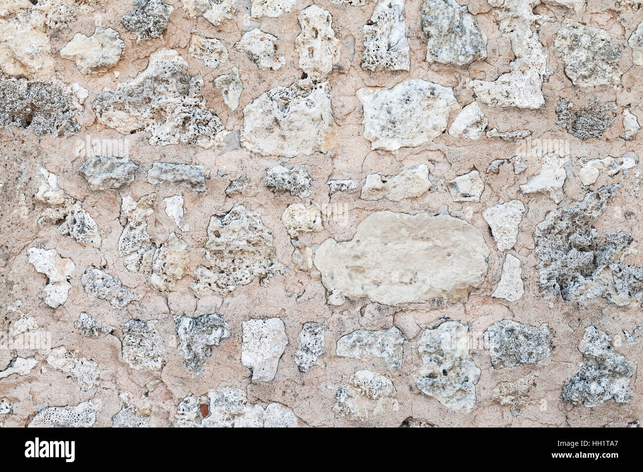 Old stone wall made of coquina, detailed background texture photo Stock Photo
