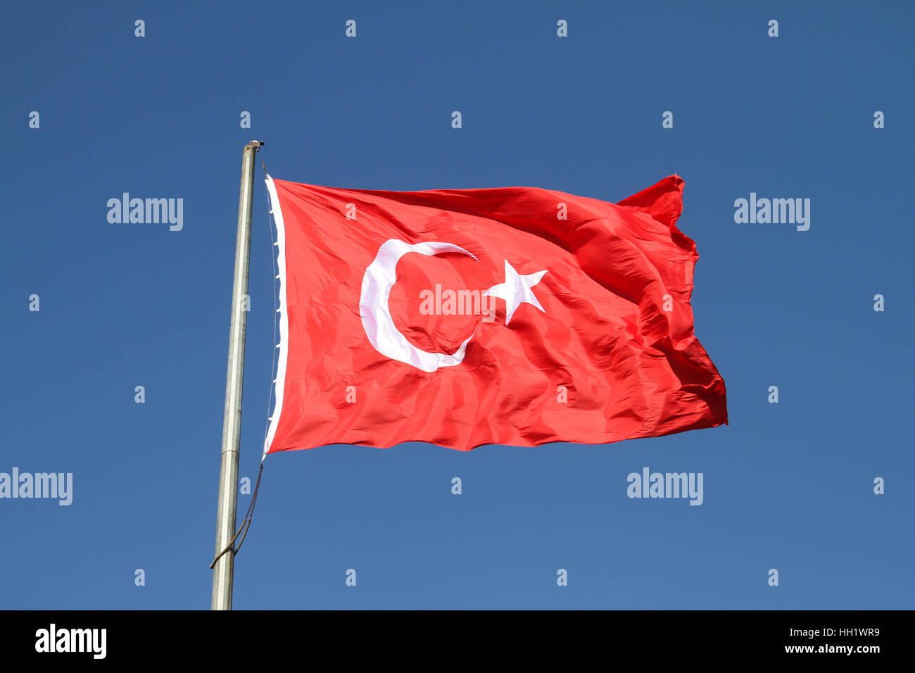 Red and White Turkish Flag with Moon and Star Stock Photo