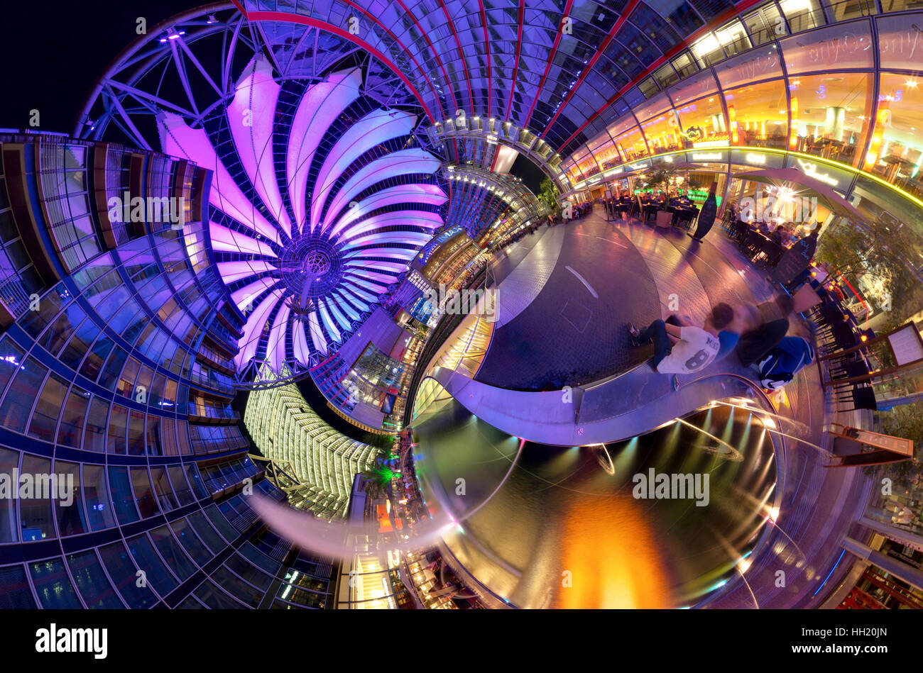 Full panoramic image of the inside of the Sony Center Potsdamer Platz at night in Berlin - Germany. Stock Photo