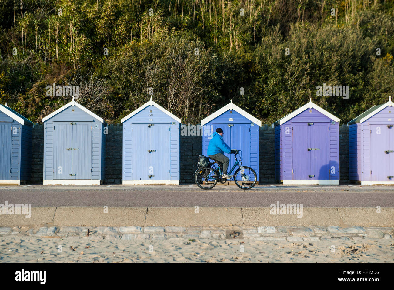 Cycling along Bournemouth beach front Stock Photo Alamy