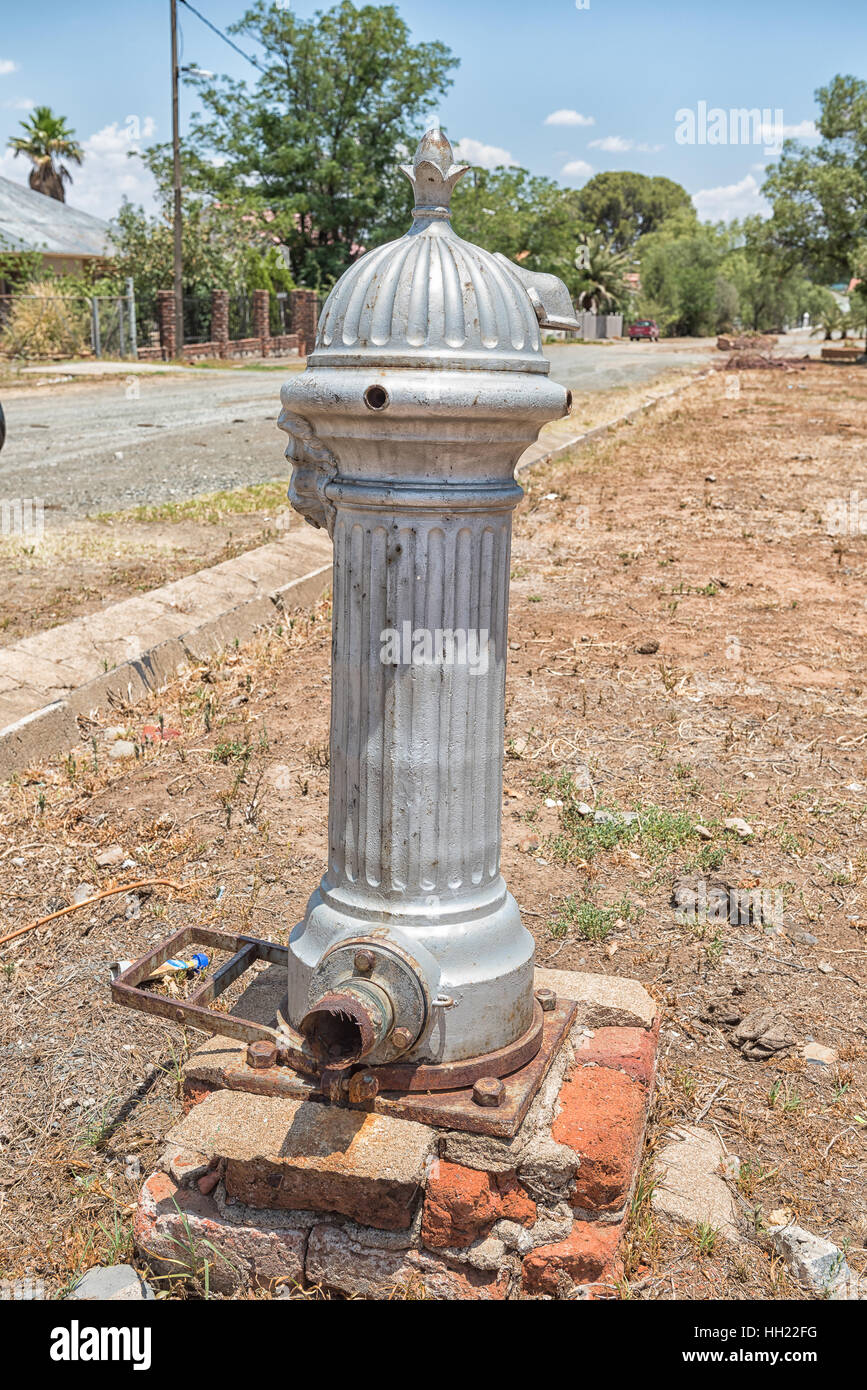 An historic coinoperated water pump in Jagersfontein, a diamond mining