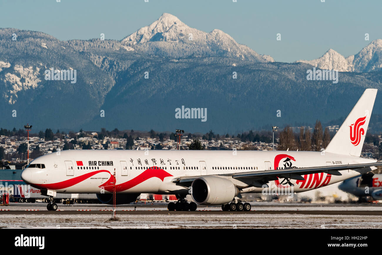 Air China plane airplane Boeing 777 (777-300ER) painted in special 'Love China' livery takes off from Vancouver International Airport Stock Photo