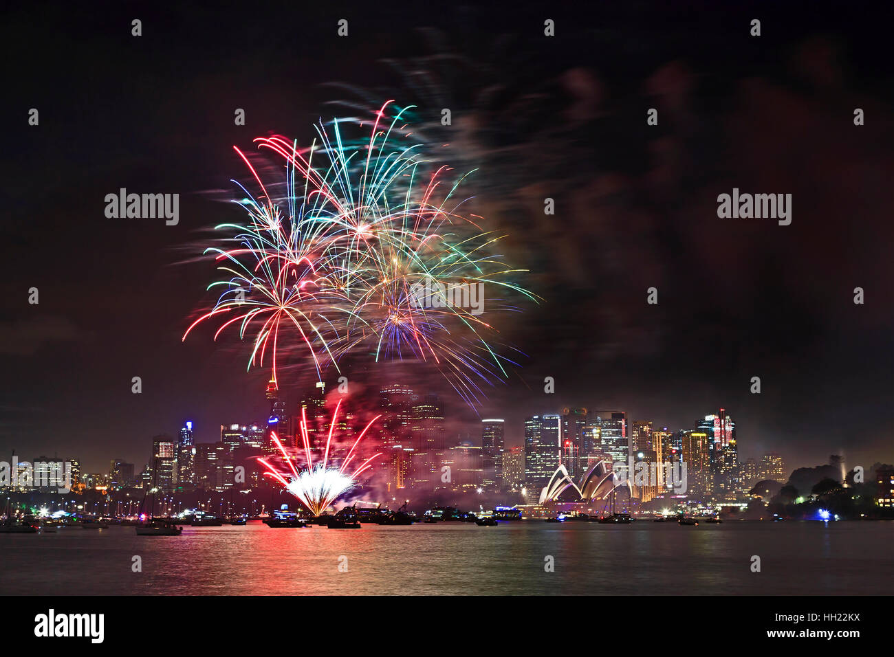 Bright flashy pyrotechnics lights balls in Sydney's sky over city CBD