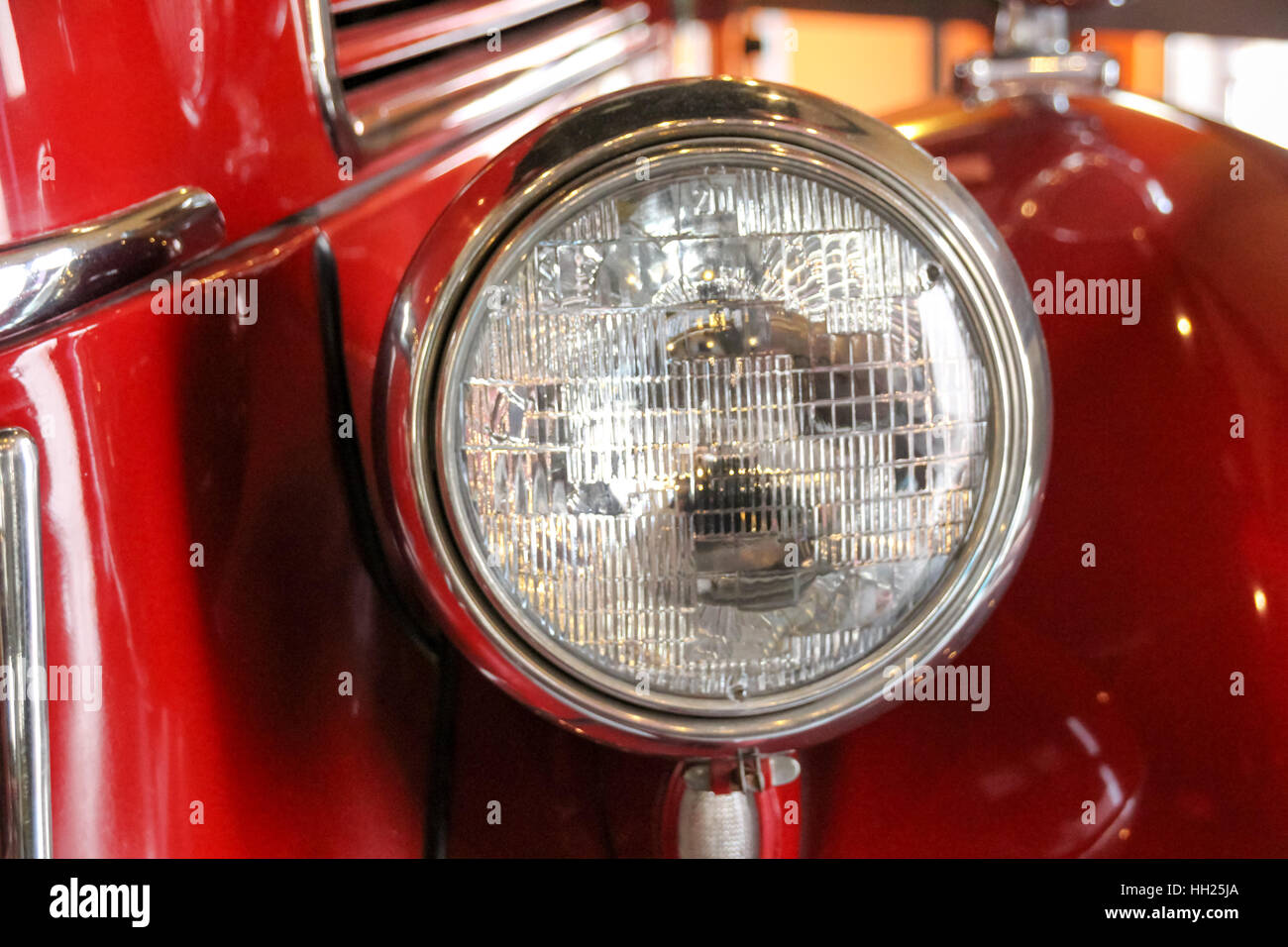 Photograph of an old red fire truck front lamp Stock Photo