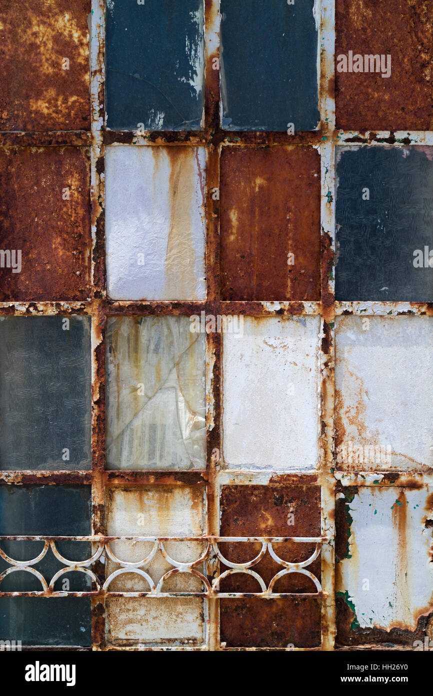Old weathered rusty metal door Stock Photo