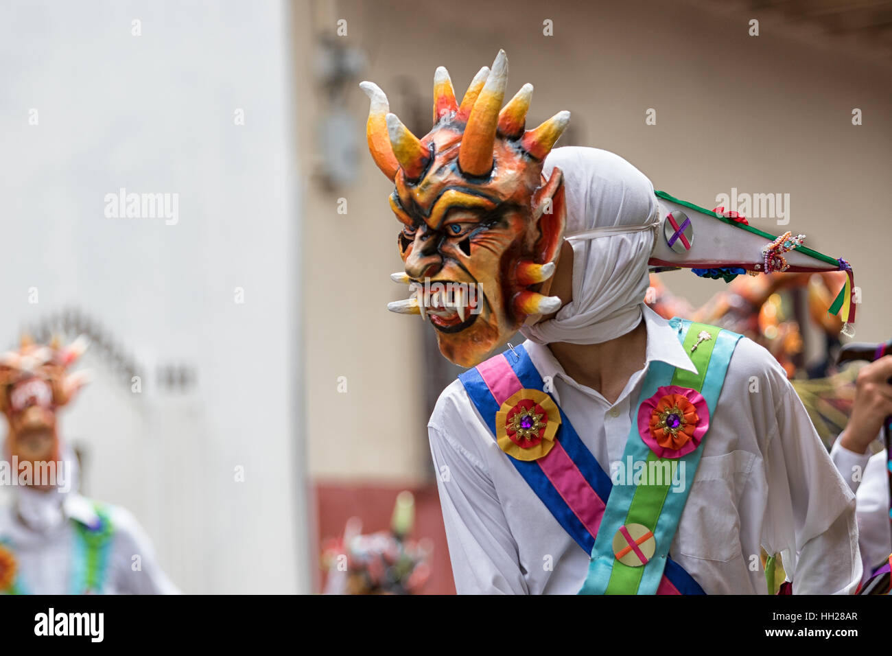 May 25, La Villa de los Santos, Panama: men wearing colorful traditional mask and clothing during Corpus Cristi celebration Stock Photo